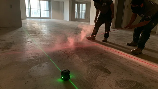 Laser layout lines on the slab before setting